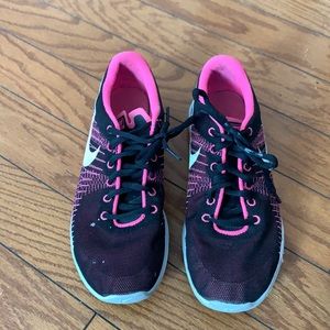 Pink and black Nike sneakers